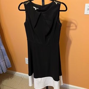 Darby black and white dress with detail zippers size 6